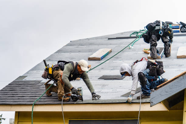 Professional Roofing technician working in North Stonington, CT